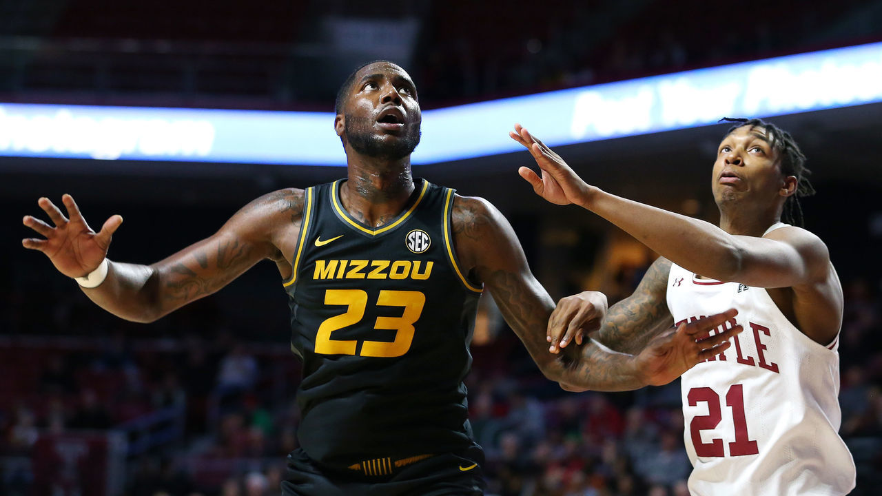 PHILADELPHIA, PA - DECEMBER 07: Jeremiah Tilmon #23 of the Missouri Tigers in action against Justyn Hamilton #21 the Temple Owls during a college basketball game at Liacouras Center on December 7, 2019 in Philadelphia, Pennsylvania. Missouri defeated Temple 64-54.