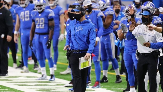 DETROIT, MICHIGAN - DECEMBER 13: Interim head coach Darrell Bevell of the Detroit Lions stands on the sideline during the second half against the Green Bay Packers at Ford Field on December 13, 2020 in Detroit, Michigan.