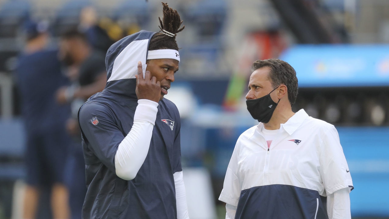 SEATTLE, WA - SEPTEMBER 20: New England Patriots quarterback Cam Newton (1) talks to Jedd Fisch, quarterbacks coach, during pre-game before they play the Seattle Seahawks. The Seattle Seahawks host The New England Patriots for a regular season NFL game at Centurylink Field in Seattle, WA on Sept. 20, 2020.