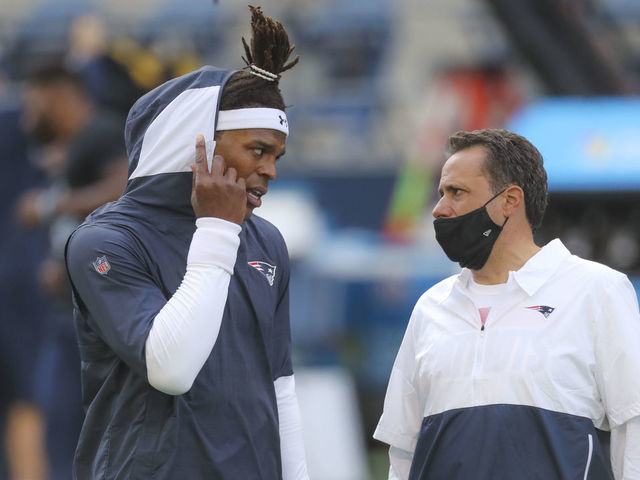 SEATTLE, WA - SEPTEMBER 20: New England Patriots quarterback Cam Newton (1) talks to Jedd Fisch, quarterbacks coach, during pre-game before they play the Seattle Seahawks. The Seattle Seahawks host The New England Patriots for a regular season NFL game at Centurylink Field in Seattle, WA on Sept. 20, 2020.