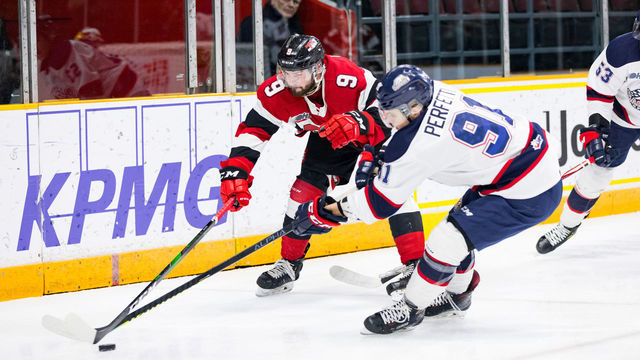 OTTAWA, ON - JANUARY 26: Ottawa 67's Left Wing Austen Keating (9) battles Saginaw Spirit Left Wing Cole Perfetti (91) for the puck during Ontario Hockey League action between the Saginaw Spirit and Ottawa 67's on January 26, 2020, at TD Place Arena in Ottawa, ON, Canada.
