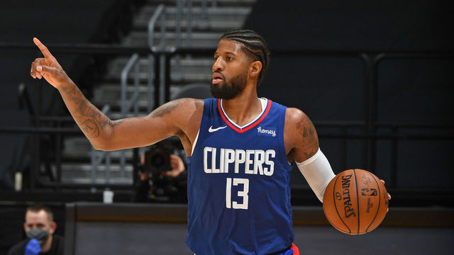 LOS ANGELES, CA - DECEMBER 22: Paul George #13 of the LA Clippers dribbles the ball up court against the Los Angeles Lakers on December 22, 2020 at STAPLES Center in Los Angeles, California. NOTE TO USER: User expressly acknowledges and agrees that, by downloading and/or using this Photograph, user is consenting to the terms and conditions of the Getty Images License Agreement. Mandatory Copyright Notice: Copyright 2020 NBAE