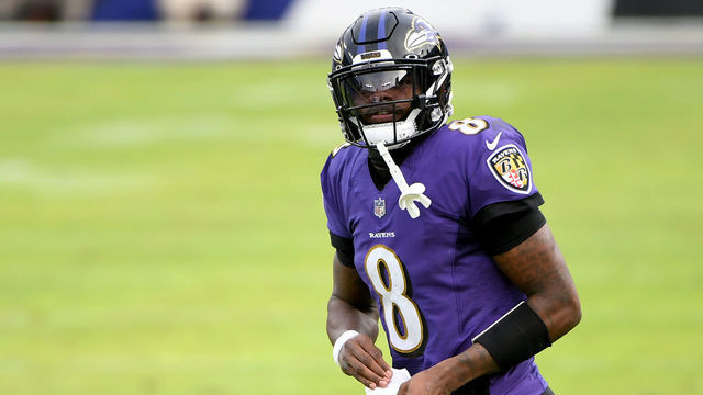 BALTIMORE, MARYLAND - DECEMBER 20: Quarterback Lamar Jackson #8 of the Baltimore Ravens looks on during a break in play against the Jacksonville Jaguars during the second half at M&T Bank Stadium on December 20, 2020 in Baltimore, Maryland.