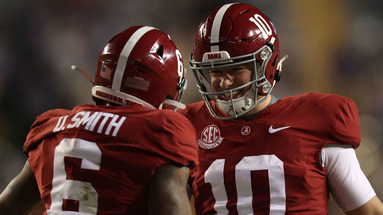 BATON ROUGE, LOUISIANA - DECEMBER 05: Mac Jones #10 of the Alabama Crimson Tide reacts after a touchdown by DeVonta Smith #6 of the Alabama Crimson Tide against the LSU Tigers at Tiger Stadium on December 05, 2020 in Baton Rouge, Louisiana.
