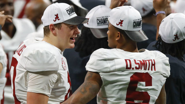 ATLANTA, GA - DECEMBER 19: Quarterback Mac Jones #10 celebrates the victory with wide receiver DeVonta Smith #6 of the Alabama Crimson Tide at the conclusion of the game against the Florida Gators during the SEC Championship game at Mercedes-Benz Stadium on December 19, 2020 in Atlanta, Georgia.