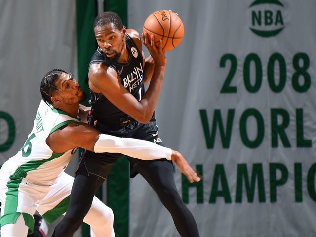 BOSTON, MA - DECEMBER 25: Kevin Durant #7 of the Brooklyn Nets handles the ball against the Boston Celtics during a game on December 25, 2020 at the TD Garden in Boston, Massachusetts. Mandatory Copyright Notice: Copyright 2020 NBAE
