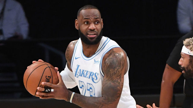 LOS ANGELES, CA - DECEMBER 25: LeBron James #23 of the Los Angeles Lakers handles the ball against the Dallas Mavericks on December 25, 2020 at STAPLES Center in Los Angeles, California. NOTE TO USER: User expressly acknowledges and agrees that, by downloading and/or using this Photograph, user is consenting to the terms and conditions of the Getty Images License Agreement. Mandatory Copyright Notice: Copyright 2020 NBAE