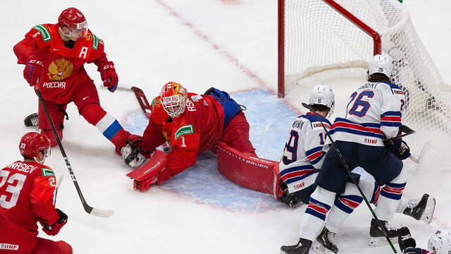 EDMONTON, AB - DECEMBER 25: Goaltender Yaroslav Askarov #1 of Russia sprawls out as Patrick Moynihan #19 and Landon Slaggert #26 of the United States look for a shot during the 2021 IIHF World Junior Championship at Rogers Place on December 25, 2020 in Edmonton, Canada.