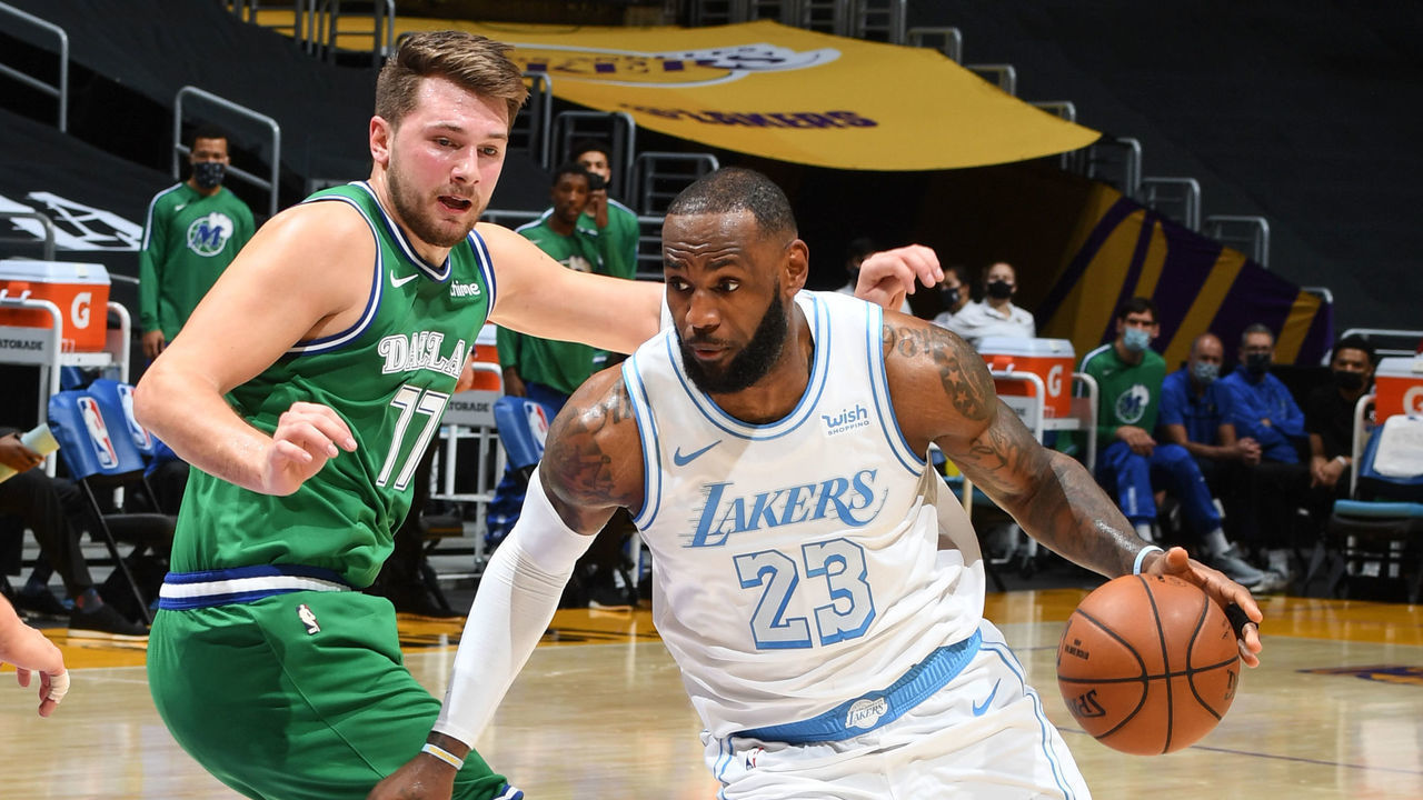 LOS ANGELES, CA - DECEMBER 25: LeBron James #23 of the Los Angeles Lakers drives to the basket during the game against the Dallas Mavericks on December 25, 2020 at STAPLES Center in Los Angeles, California. NOTE TO USER: User expressly acknowledges and agrees that, by downloading and/or using this Photograph, user is consenting to the terms and conditions of the Getty Images License Agreement. Mandatory Copyright Notice: Copyright 2020 NBAE