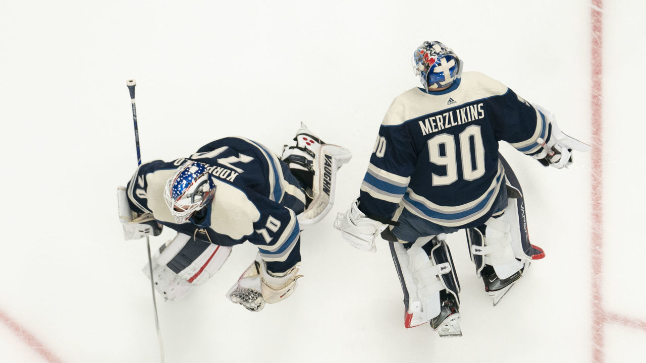 COLUMBUS, OH - DECEMBER 29: Columbus Blue Jackets goaltender Joonas Korpisalo (70) and Columbus Blue Jackets goaltender Elvis Merzlikins (90) skates in warm-ups prior to the game between the Columbus Blue Jackets and the Chicago Blackhawks at Nationwide Arena in Columbus, Ohio on December 29, 2019.
