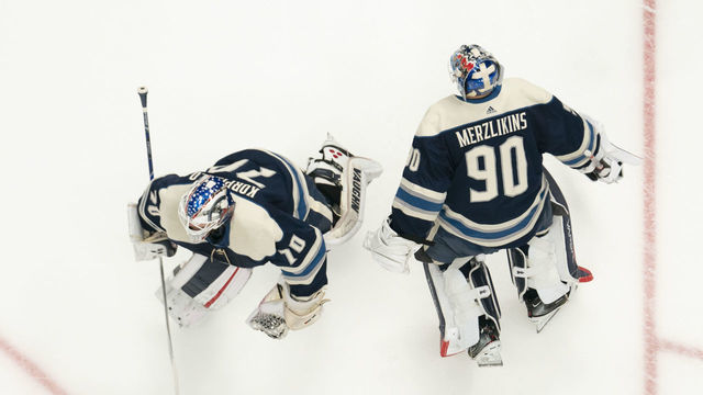 COLUMBUS, OH - DECEMBER 29: Columbus Blue Jackets goaltender Joonas Korpisalo (70) and Columbus Blue Jackets goaltender Elvis Merzlikins (90) skates in warm-ups prior to the game between the Columbus Blue Jackets and the Chicago Blackhawks at Nationwide Arena in Columbus, Ohio on December 29, 2019.