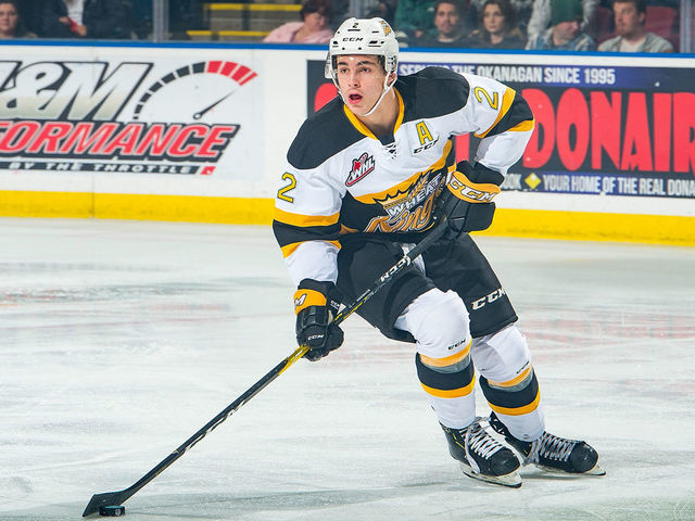 KELOWNA, BC - NOVEMBER 03: Braden Schneider #2 of the Brandon Wheat Kings skates with the puck against the Kelowna Rockets at Prospera Place on November 3, 2018 in Kelowna, Canada.