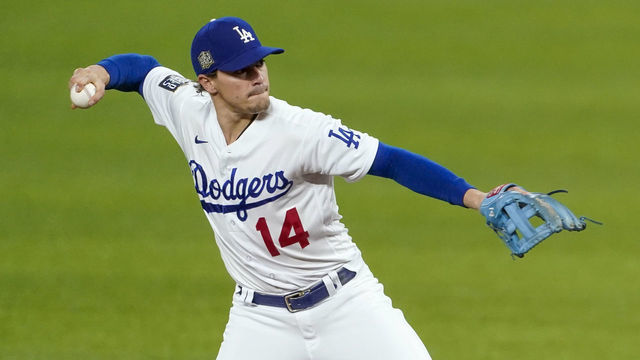 ARLINGTON, TX - OCTOBER 21: Enrique Hernandez #14 of the Los Angeles Dodgers throws to first in the fifth inning during Game 2 of the 2020 World Series between the Los Angeles Dodgers and the Tampa Bay Rays at Globe Life Field on Wednesday, October 21, 2020 in Arlington, Texas.