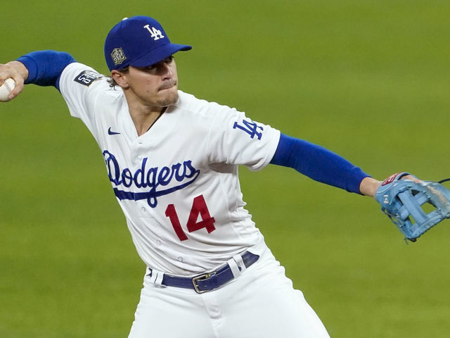 ARLINGTON, TX - OCTOBER 21: Enrique Hernandez #14 of the Los Angeles Dodgers throws to first in the fifth inning during Game 2 of the 2020 World Series between the Los Angeles Dodgers and the Tampa Bay Rays at Globe Life Field on Wednesday, October 21, 2020 in Arlington, Texas.