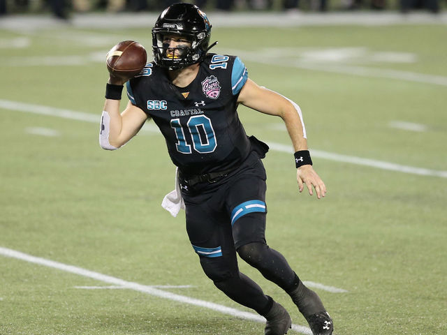ORLANDO, FL - DECEMBER 26: Coastal Carolina Chanticleers quarterback Grayson McCall (10) runs with the ball during the FBC Mortgage Cure Bowl game between the Liberty Flames and the Coastal Carolina Chanticleers on December 26, 2020 at Camping World Stadium in Orlando, Fl.