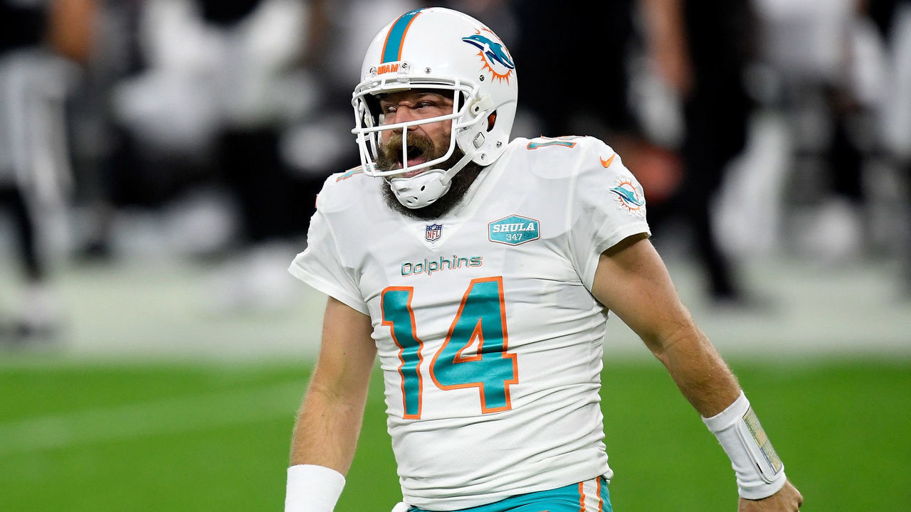 LAS VEGAS, NEVADA - DECEMBER 26: Ryan Fitzpatrick #14 of the Miami Dolphins reacts to a touchdown pass during the fourth quarter of a game against the Las Vegas Raiders at Allegiant Stadium on December 26, 2020 in Las Vegas, Nevada.