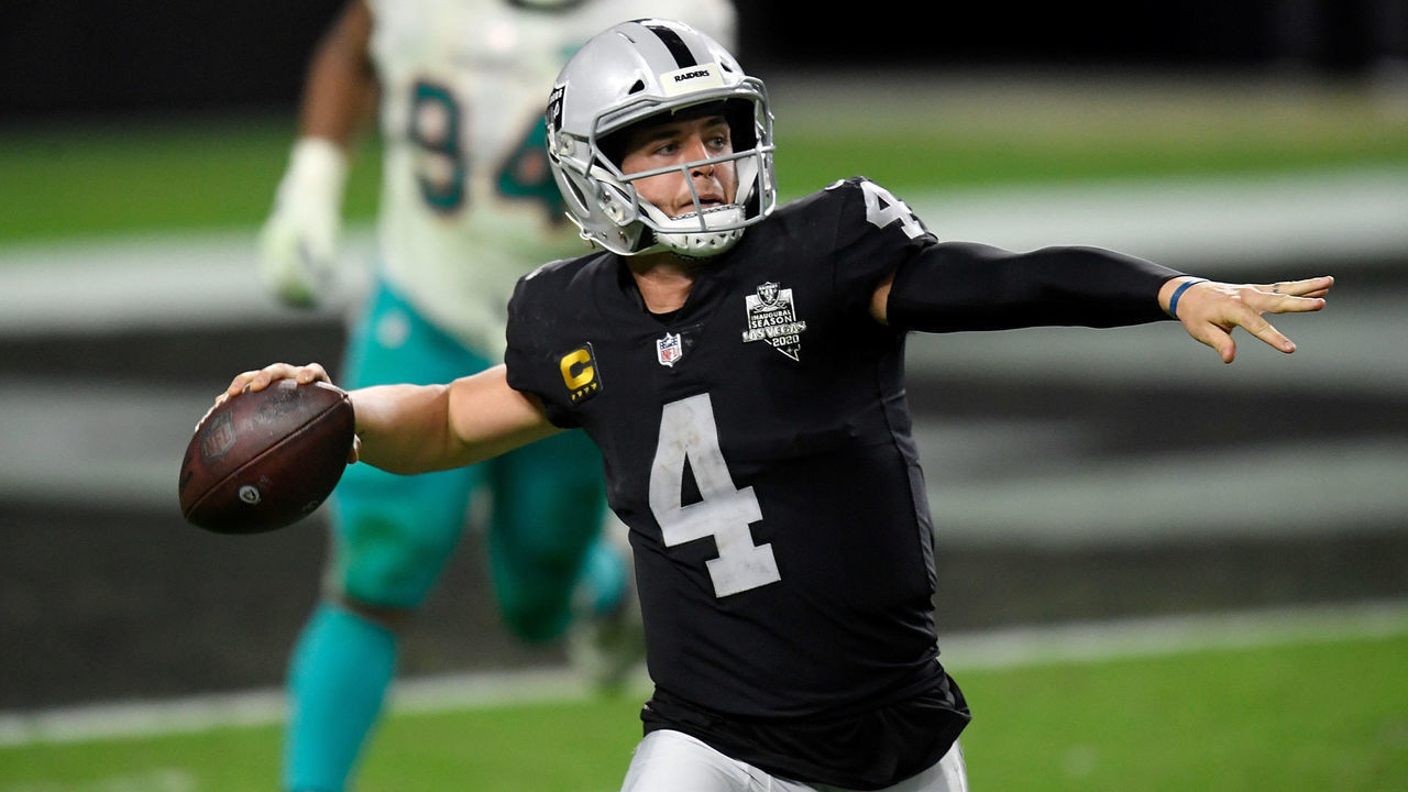 LAS VEGAS, NEVADA - DECEMBER 26: Derek Carr #4 of the Las Vegas Raiders throws a pass for a touchdown during the fourth quarter of a game against the Miami Dolphins at Allegiant Stadium on December 26, 2020 in Las Vegas, Nevada.
