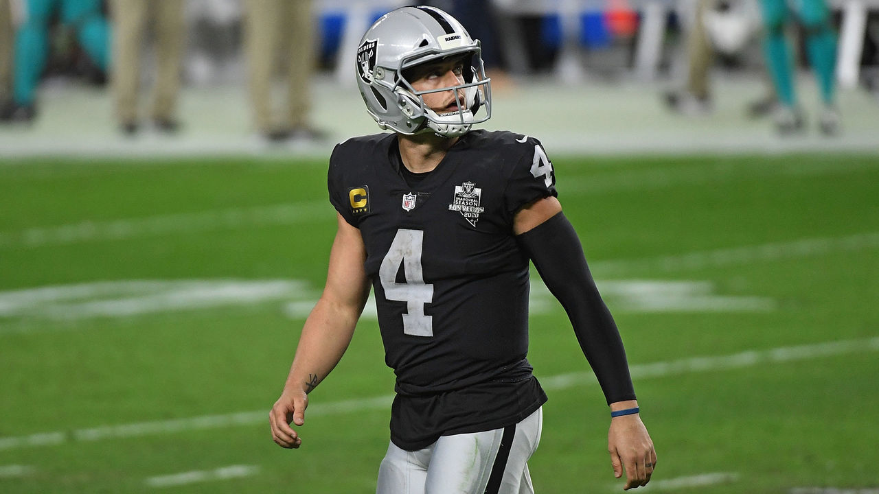 LAS VEGAS, NEVADA - DECEMBER 26: Derek Carr #4 of the Las Vegas Raiders looks to the scoreboard during the third quarter of a game against the Miami Dolphins at Allegiant Stadium on December 26, 2020 in Las Vegas, Nevada.