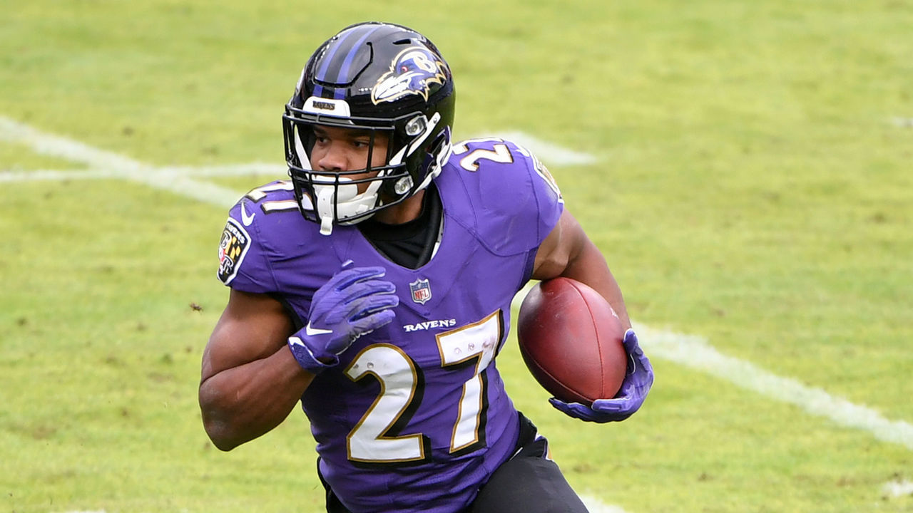 BALTIMORE, MARYLAND - DECEMBER 20: Running back J.K. Dobbins #27 of the Baltimore Ravens runs against the Jacksonville Jaguars during the first half at M&T Bank Stadium on December 20, 2020 in Baltimore, Maryland.