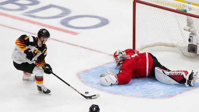 EDMONTON, AB - DECEMBER 26: Goaltender Devon Levi #1 of Canada defends the net against Tim Stutzle #8 of Germany during the 2021 IIHF World Junior Championship at Rogers Place on December 26, 2020 in Edmonton, Canada.
