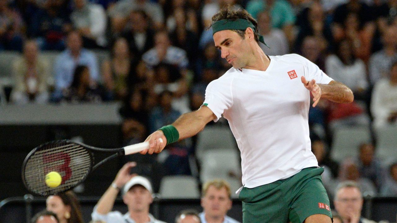 Switzerland's Roger Federer plays a return to Spain's Rafael Nadal during their tennis match at The Match in Africa at the Cape Town Stadium, in Cape Town on February 7, 2020.