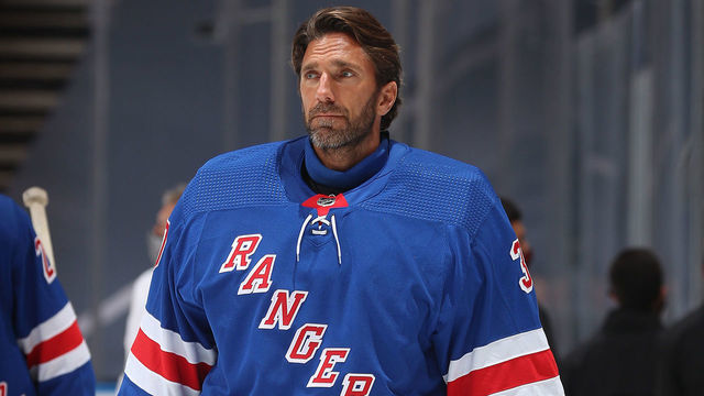TORONTO, ONTARIO - AUGUST 04: Henrik Lundqvist #30 of the New York Rangers looks on after the ceremonial handshake after Game Three of the Eastern Conference Qualification Round prior to the 2020 NHL Stanley Cup Playoffs at Scotiabank Arena on August 04, 2020 in Toronto, Ontario. The Hurricanes defeated the Rangers 4-1 in this game to win the five-game series 3-0.