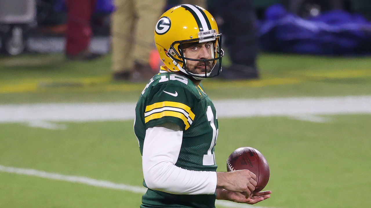 GREEN BAY, WISCONSIN - DECEMBER 19: Aaron Rodgers #12 of the Green Bay Packers warms up before the game against the Carolina Panthers at Lambeau Field on December 19, 2020 in Green Bay, Wisconsin.