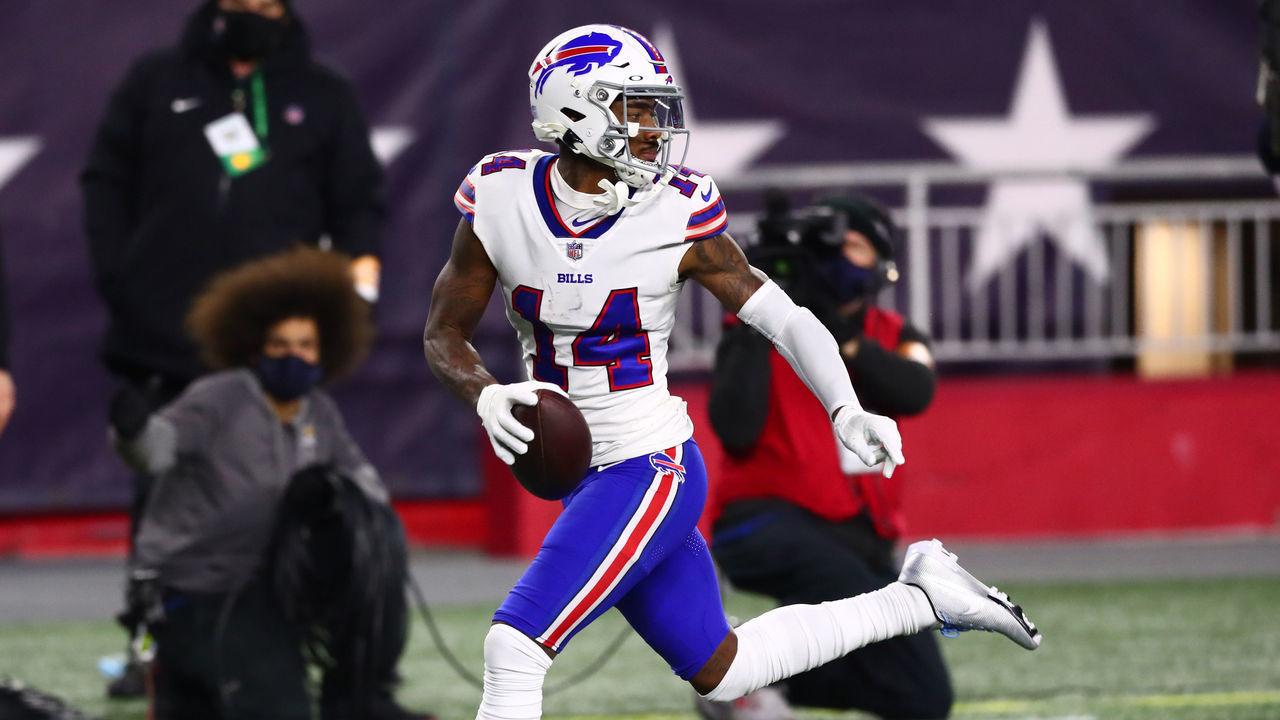 FOXBOROUGH, MASSACHUSETTS - DECEMBER 28: Stefon Diggs #14 of the Buffalo Bills runs the ball into the end zone for a touchdown during the first half against the New England Patriots at Gillette Stadium on December 28, 2020 in Foxborough, Massachusetts.