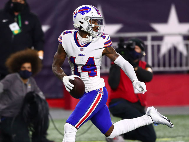 FOXBOROUGH, MASSACHUSETTS - DECEMBER 28: Stefon Diggs #14 of the Buffalo Bills runs the ball into the end zone for a touchdown during the first half against the New England Patriots at Gillette Stadium on December 28, 2020 in Foxborough, Massachusetts.