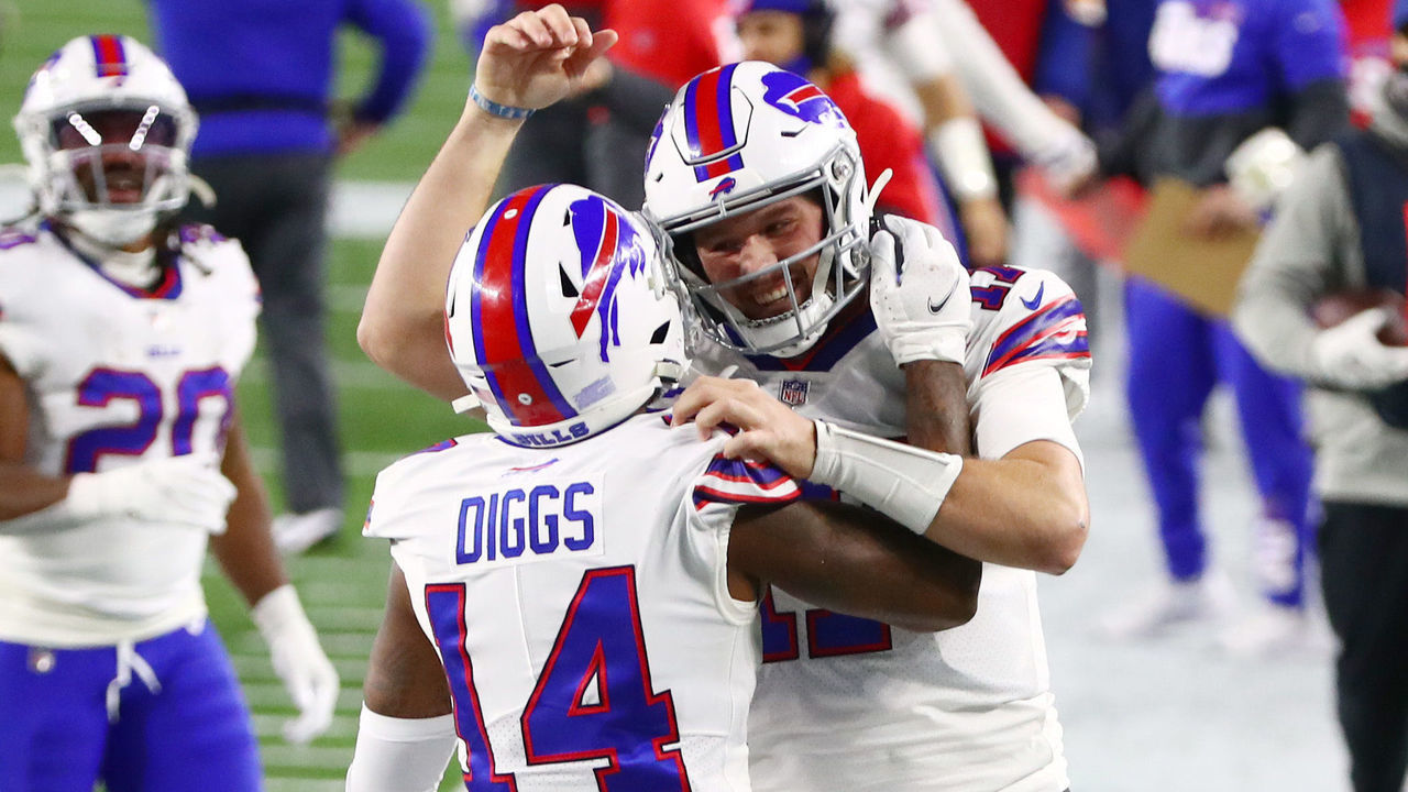 FOXBOROUGH, MASSACHUSETTS - DECEMBER 28: Josh Allen #17 congratulates Stefon Diggs #14 of the Buffalo Bills on his touchdown during the first half at Gillette Stadium on December 28, 2020 in Foxborough, Massachusetts.