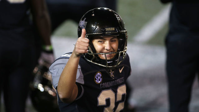 NASHVILLE, TN - DECEMBER 12: Vanderbilt Commodores place kicker Sarah Fuller (32) gives a thumbs up after successfully kicking her second point after attempt during a game between the Vanderbilt Commodores and Tennessee Volunteers in which she became the first female to score a point for a power five conference school, December 12, 2020 at Vanderbilt Stadium in Nashville, Tennessee.
