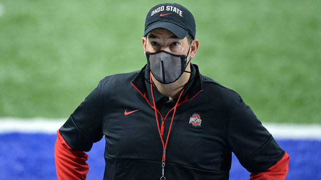 INDIANAPOLIS, IN - DECEMBER 19: Ohio State Buckeyes head coach Ryan Day looks on as players warm up for the Big Ten Conference Championship football game between the Northwestern Wildcats and the Ohio State Buckeyes on December 19, 2020, at Lucas Oil Stadium in Indianapolis, Indiana.