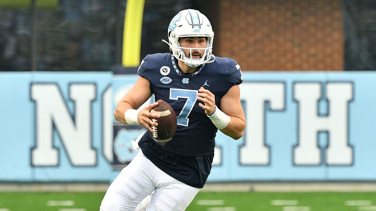 CHAPEL HILL, NORTH CAROLINA - OCTOBER 10: Sam Howell #7 of the North Carolina Tar Heels rolls out against the Virginia Tech Hokies during their game at Kenan Stadium on October 10, 2020 in Chapel Hill, North Carolina. North Carolina won 56-45.