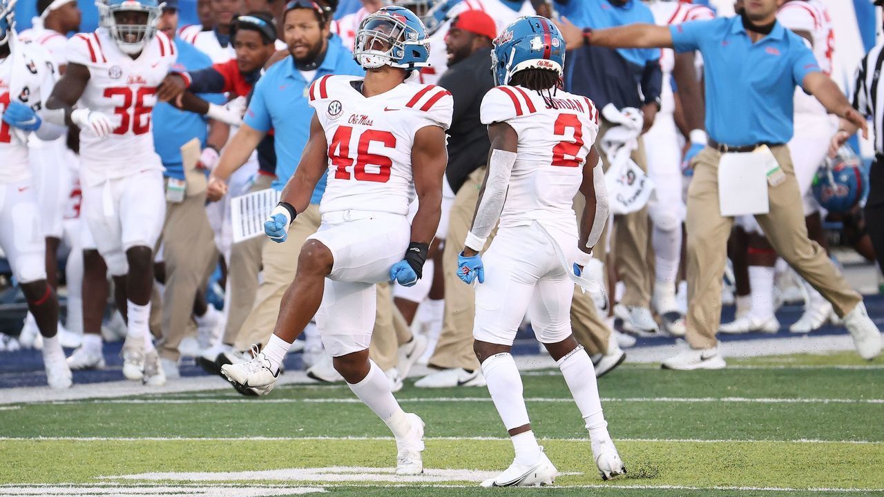 LEXINGTON, KENTUCKY - OCTOBER 03: MoMo Sanogo #46 of the Ole Miss Rebels celebrates after a fourth down stop in the 42-41 OT win over the Kentucky Wildcats at Commonwealth Stadium on October 03, 2020 in Lexington, Kentucky.