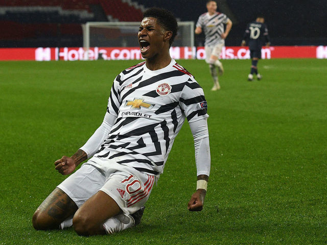 PARIS, FRANCE - OCTOBER 20: Marcus Rashford of Manchester United celebrates after scoring his sides second goal during the UEFA Champions League Group H stage match between Paris Saint-Germain and Manchester United at Parc des Princes on October 20, 2020 in Paris, France. Sporting stadiums around Europe remain under strict restrictions due to the Coronavirus Pandemic as Government social distancing laws prohibit fans inside venues resulting in games being played behind closed doors.