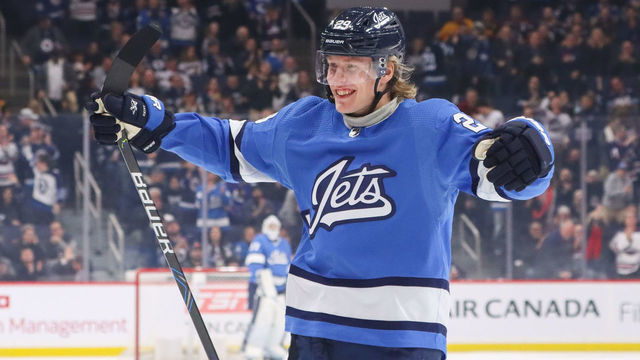 WINNIPEG, MB - JANUARY 14: Patrik Laine #29 of the Winnipeg Jets is all smiles as he celebrates a first period goal against the Vancouver Canucks at the Bell MTS Place on January 14, 2020 in Winnipeg, Manitoba, Canada. The Jets shutout the Canucks 4-0.