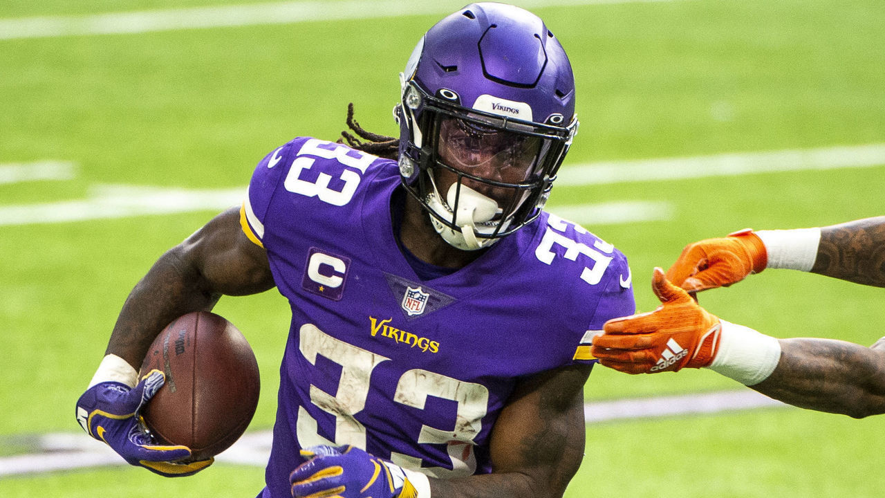 MINNEAPOLIS, MN - DECEMBER 20: Dalvin Cook #33 of the Minnesota Vikings runs with the ball in the second quarter of the game against the Chicago Bears at U.S. Bank Stadium on December 20, 2020 in Minneapolis, Minnesota.
