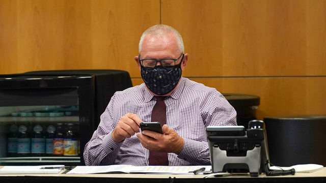 PITTSBURGH, PENNSLYVANIA- OCTOBER 07: General manager Jim Rutherford of the Pittsburgh Penguins sits at the draft table during rounds 2-7 of the 2020 NHL Entry Draft at PPG Paints Arena on October 07, 2020 in Pittsburgh, Pennsylvania. The 2020 NHL Draft was held virtually due to the ongoing Coronavirus pandemic.