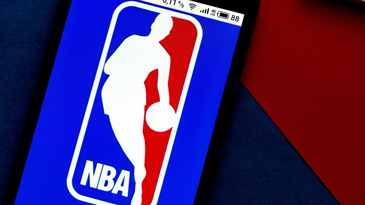 UKRAINE - 2020/09/21: In this photo illustration an NBA logo seen displayed on a smartphone. (Photo Illustration by Igor Golovniov/SOPA Images/LightRocket via Getty Images)