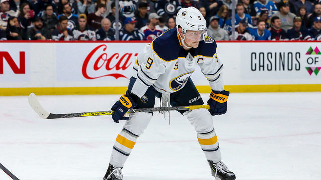 WINNIPEG, MB - MARCH 3: Jack Eichel #9 of the Buffalo Sabres gets set during a second period face-off against the Winnipeg Jets at the Bell MTS Place on March 3, 2020 in Winnipeg, Manitoba, Canada.