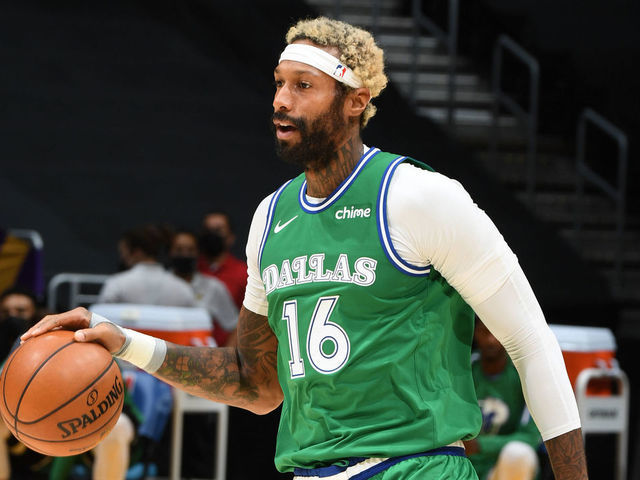 LOS ANGELES, CA - DECEMBER 25: James Johnson #16 of the Dallas Mavericks dribbles the ball during the game against the Los Angeles Lakers on December 25, 2020 at STAPLES Center in Los Angeles, California. NOTE TO USER: User expressly acknowledges and agrees that, by downloading and/or using this Photograph, user is consenting to the terms and conditions of the Getty Images License Agreement. Mandatory Copyright Notice: Copyright 2020 NBAE