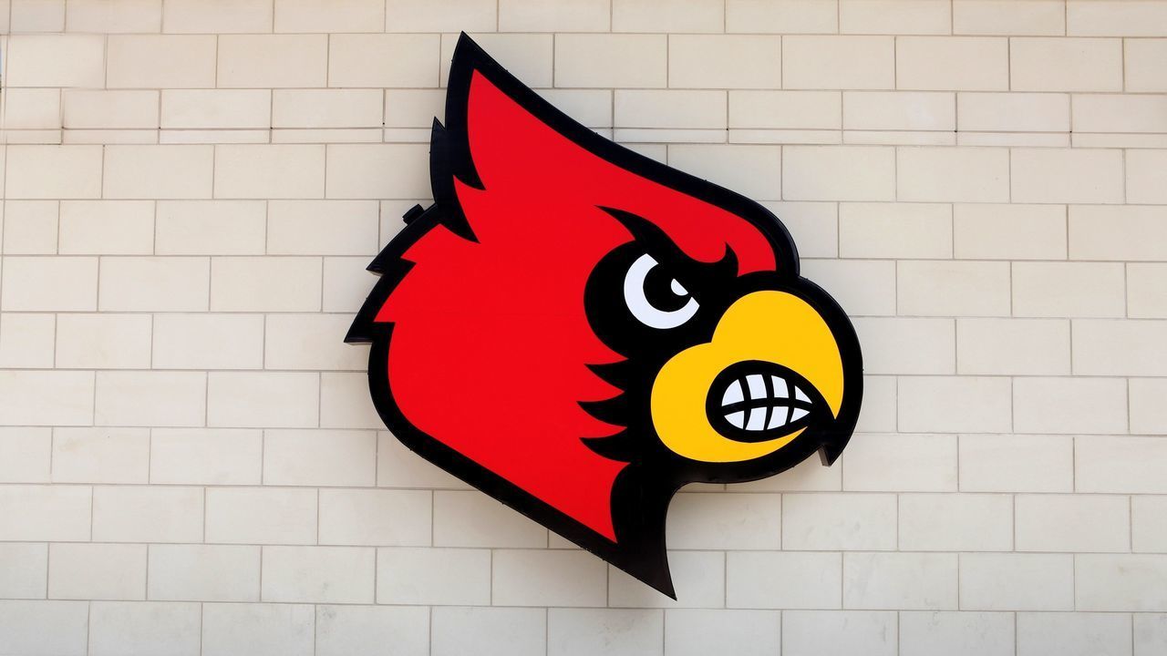 LOUISVILLE, KY - MAY 30: Louisville Cardinals logo at KFC Yum Center, home of the Louisville Cardinals basketball team on May 30, 2014 in Louisville, Kentucky.