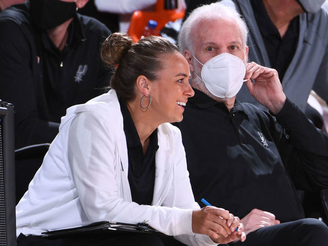 Orlando, FL - AUGUST 13: Assistant Coach, Becky Hammon, and Head Coach Gregg Popovich of the San Antonio Spurs talk during a game against the Utah Jazz on August 13, 2020 at The Field House at ESPN Wide World Of Sports Complex at in Orlando, Florida. NOTE TO USER: User expressly acknowledges and agrees that, by downloading and/or using this Photograph, user is consenting to the terms and conditions of the Getty Images License Agreement. Mandatory Copyright Notice: Copyright 2020 NBAE
