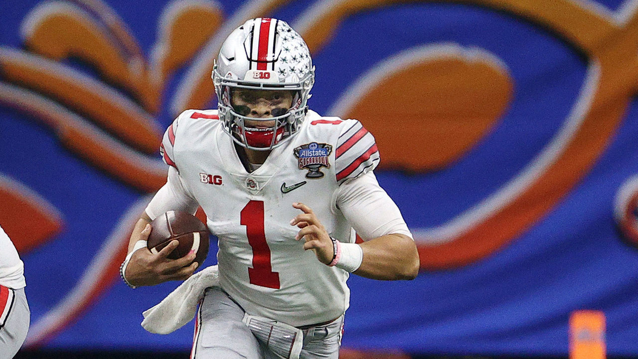 NEW ORLEANS, LOUISIANA - JANUARY 01: Justin Fields #1 of the Ohio State Buckeyes carries the ball against the Clemson Tigers in the first half during the College Football Playoff semifinal game at the Allstate Sugar Bowl at Mercedes-Benz Superdome on January 01, 2021 in New Orleans, Louisiana.