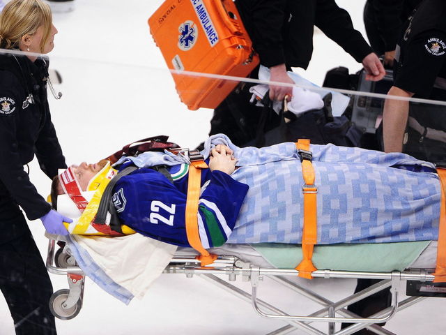 Daniel Sedin 'OK' after hit, but Tortorella is not happy with the Flames