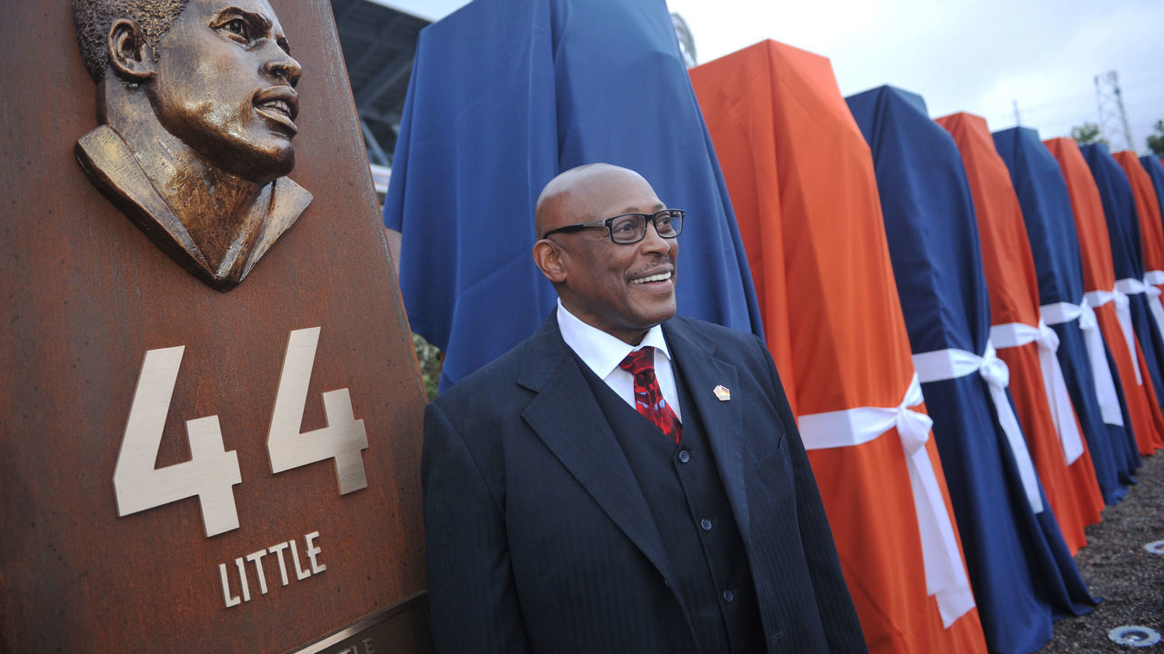 DENVER, CO - September 27 : Pro Football Hall of Fame running back Floyd Little unveiled the sculpture at the Denver Broncos Ring of Fame Plaza in Sports Authority Field at Mile High. Denver, Colorado. September 27, 2013. The Plaza feature pillars honoring each of the 24 players in the Broncos Ring of Fame.