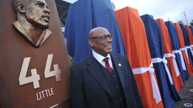 DENVER, CO - September 27 : Pro Football Hall of Fame running back Floyd Little unveiled the sculpture at the Denver Broncos Ring of Fame Plaza in Sports Authority Field at Mile High. Denver, Colorado. September 27, 2013. The Plaza feature pillars honoring each of the 24 players in the Broncos Ring of Fame.