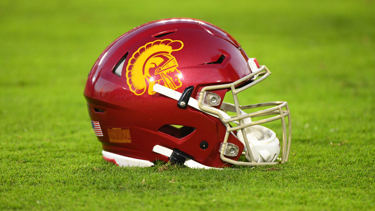 LOS ANGELES, CA - OCTOBER 19: A USC helmet lays on the grass during a college football game between the Arizona Wildcats and the USC Trojans on October 19, 2019, at Los Angeles Memorial Coliseum in Los Angeles, CA.