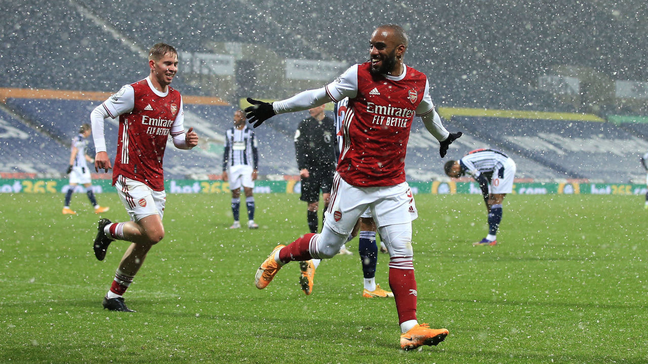 WEST BROMWICH, ENGLAND - JANUARY 02: Alexandre Lacazette of Arsenal celebrates their 2nd goal in the snow during the Premier League match between West Bromwich Albion and Arsenal at The Hawthorns on January 2, 2021 in West Bromwich, United Kingdom. The match will be played without fans, behind closed doors as a Covid-19 precaution.