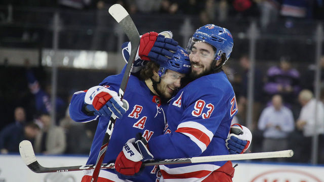 NEW YORK, NEW YORK - MARCH 05: Artemi Panarin #10 and Mika Zibanejad #93 of the New York Rangers celebrate a 5-4 overtime victory over the Washington Capitals at Madison Square Garden on March 05, 2020 in New York City.